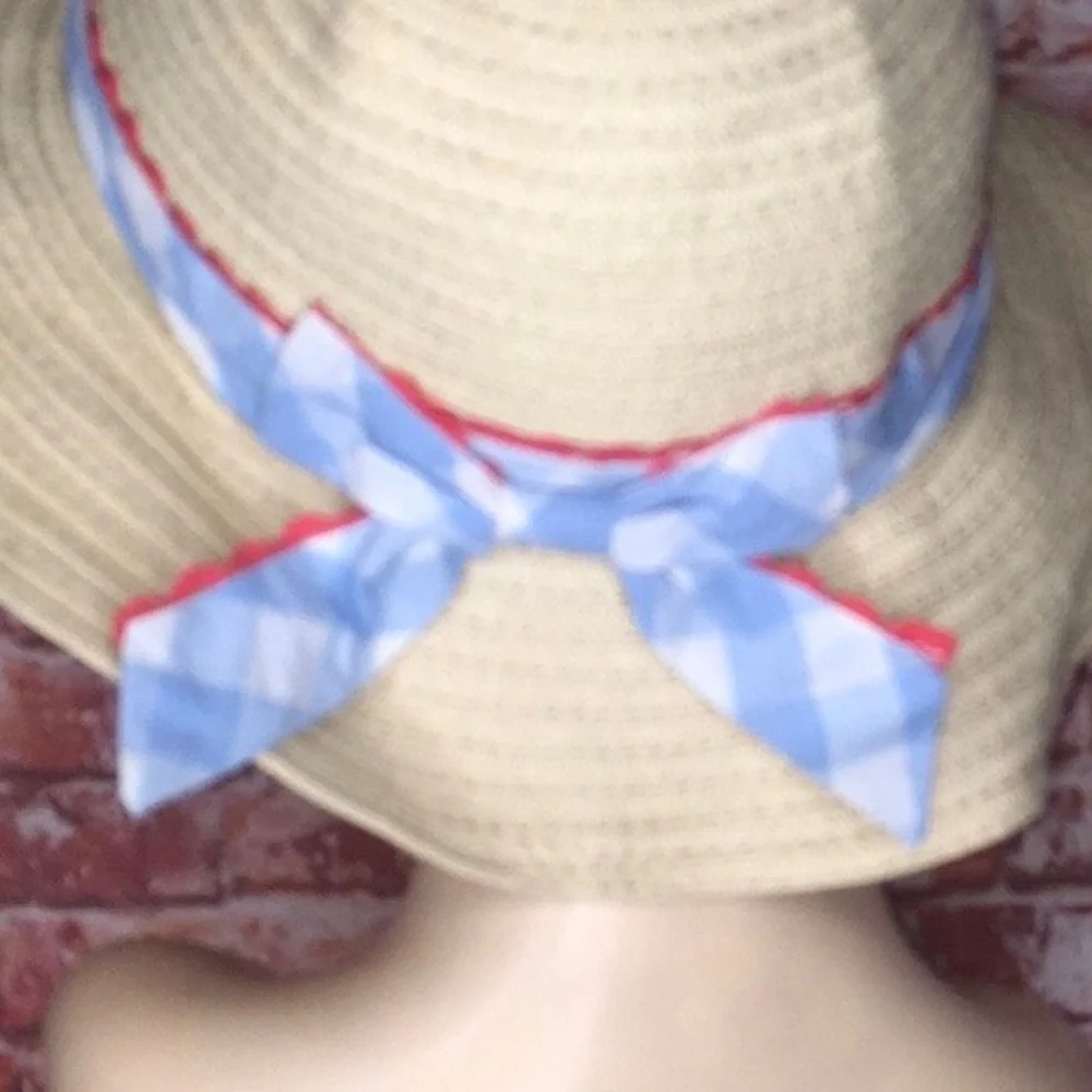 Tan Straw Sun Hat with Blue and Red Cotton Ribbon